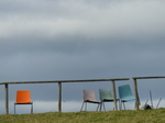 FZ023693 Chairs with dark clouds.jpg